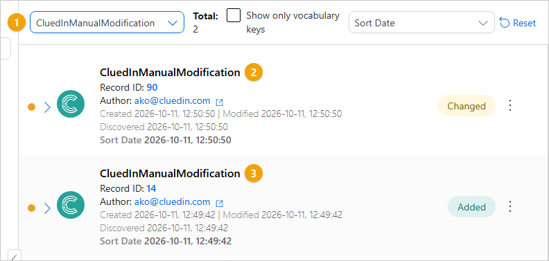 The History page filtered to the CluedInManualModification branch, showing its two data parts, one Changed and one Added